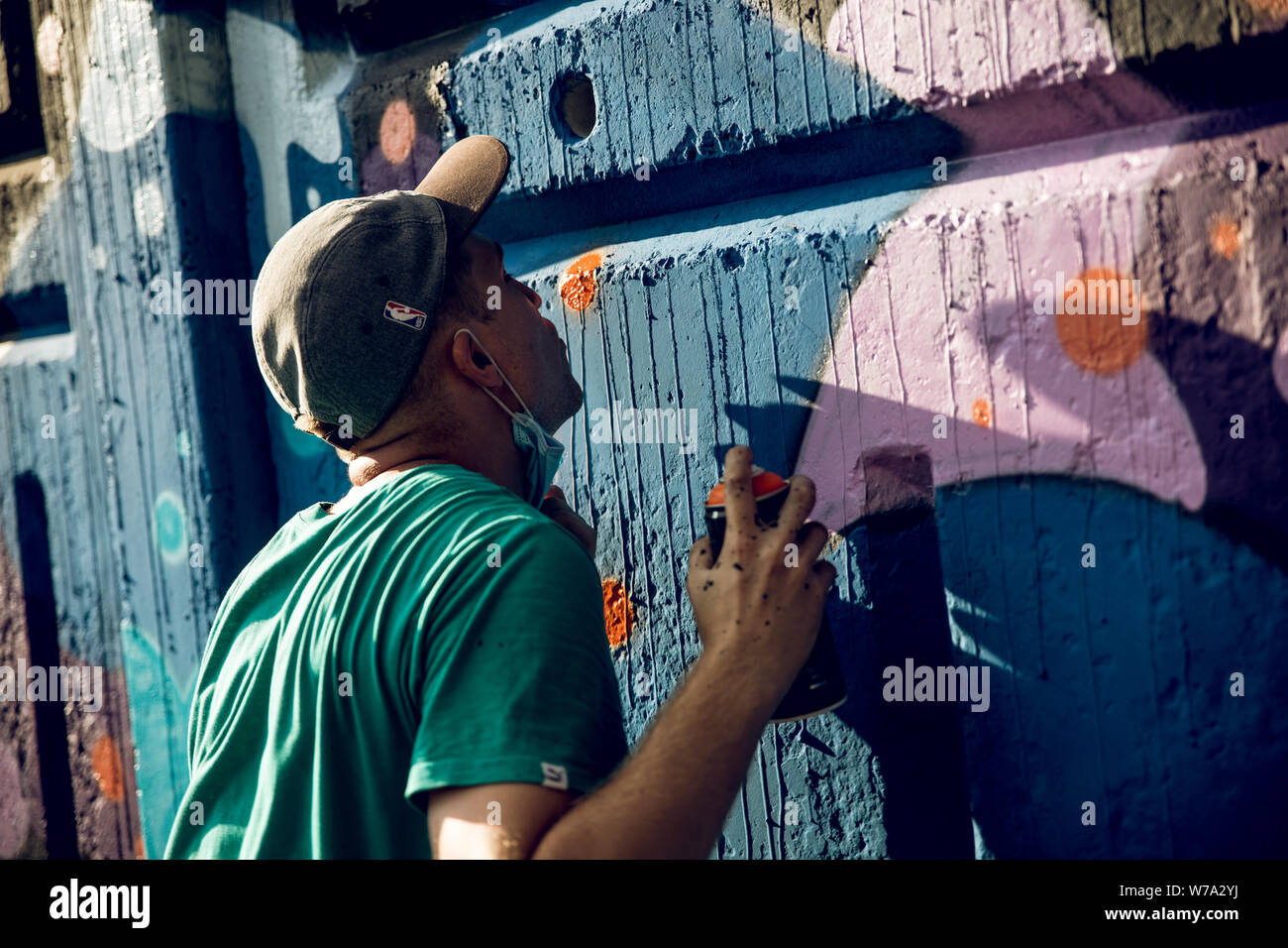 Drawing graffiti on the wall Stock Photo Alamy