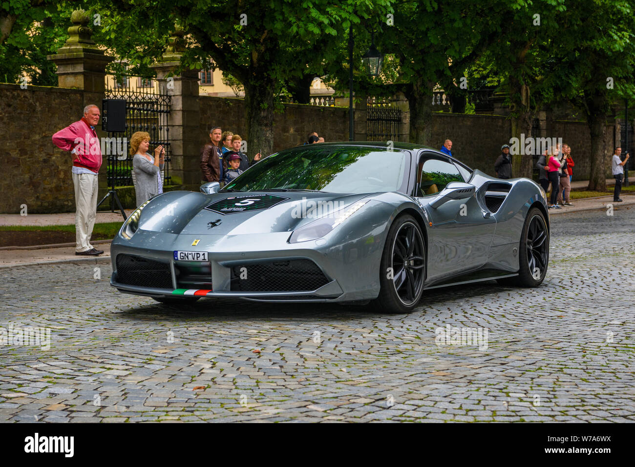 GERMANY, FULDA - JUL 2019: gray silver FERRARI 488 coupe Type F142M is a mid-engine sports car produced by the Italian automobile manufacturer Ferrari Stock Photo