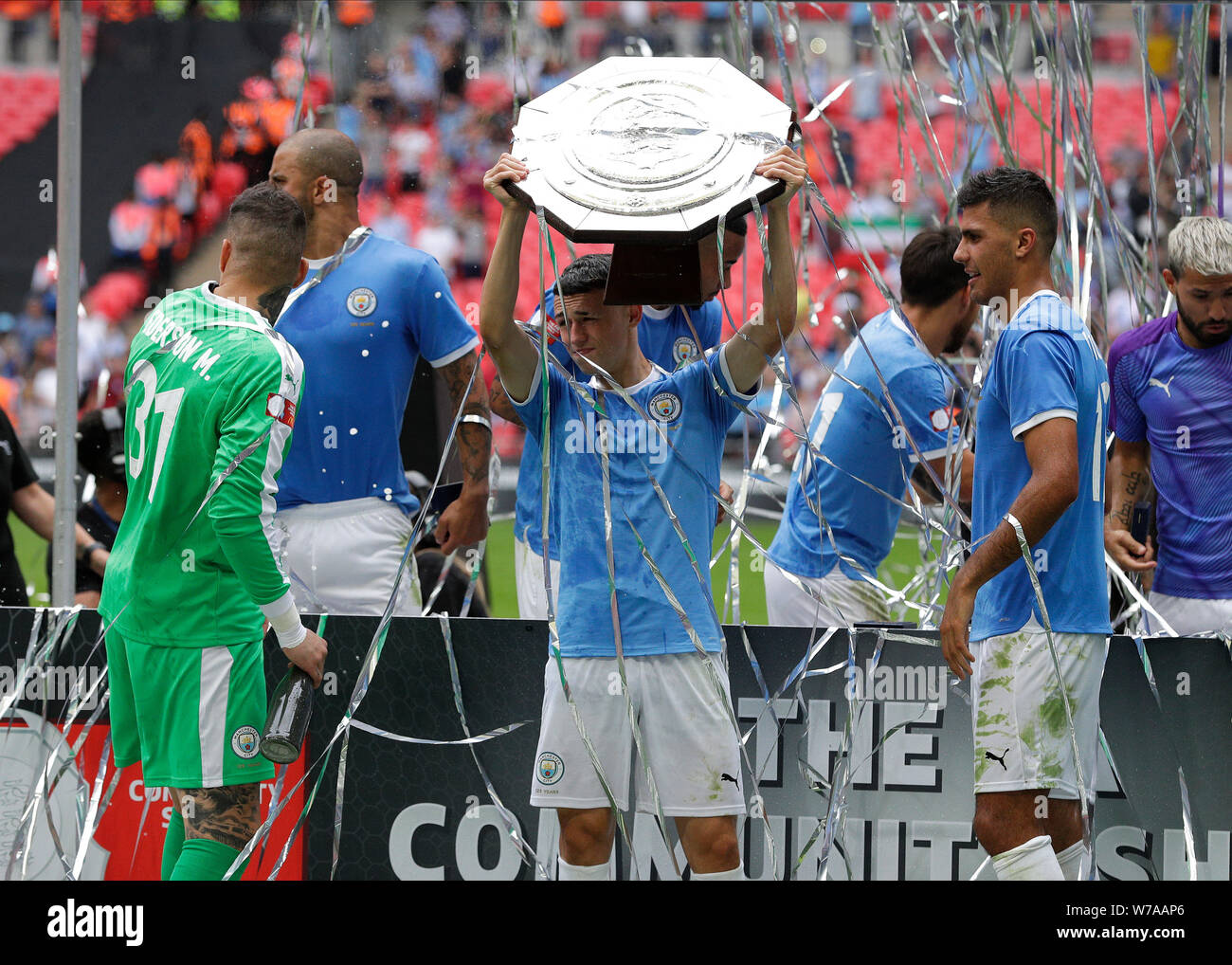 Wembley Stadium, Wembley, UK. 4th Aug, 2019. FA Community Shield Final football; Liverpool versus Manchester City; Phil Foden of Manchester Cty celebrates with the FA Community Shield after defeating Liverpool on penalties at 5-4 Credit: Action Plus Sports/Alamy Live News Stock Photo