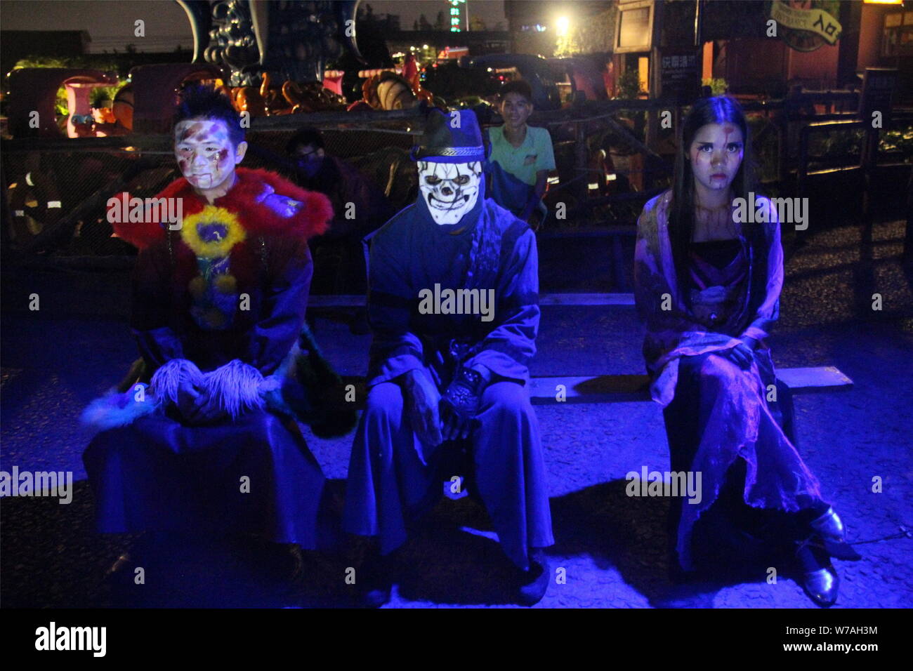 Chinese college students dressing up as demons and monsters perform during a celebration event for the upcoming Halloween at Chuanlord Tourism & Leisu Stock Photo