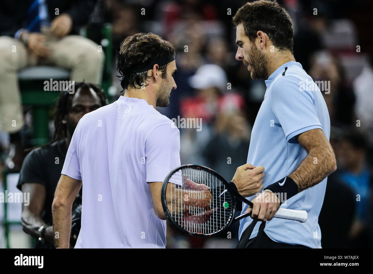 Roger Federer of Switzerland interacts with Juan Martin Del Potro, or Delpo,  of Argentina after their semifinal of men's singles during the Shanghai R  Stock Photo - Alamy