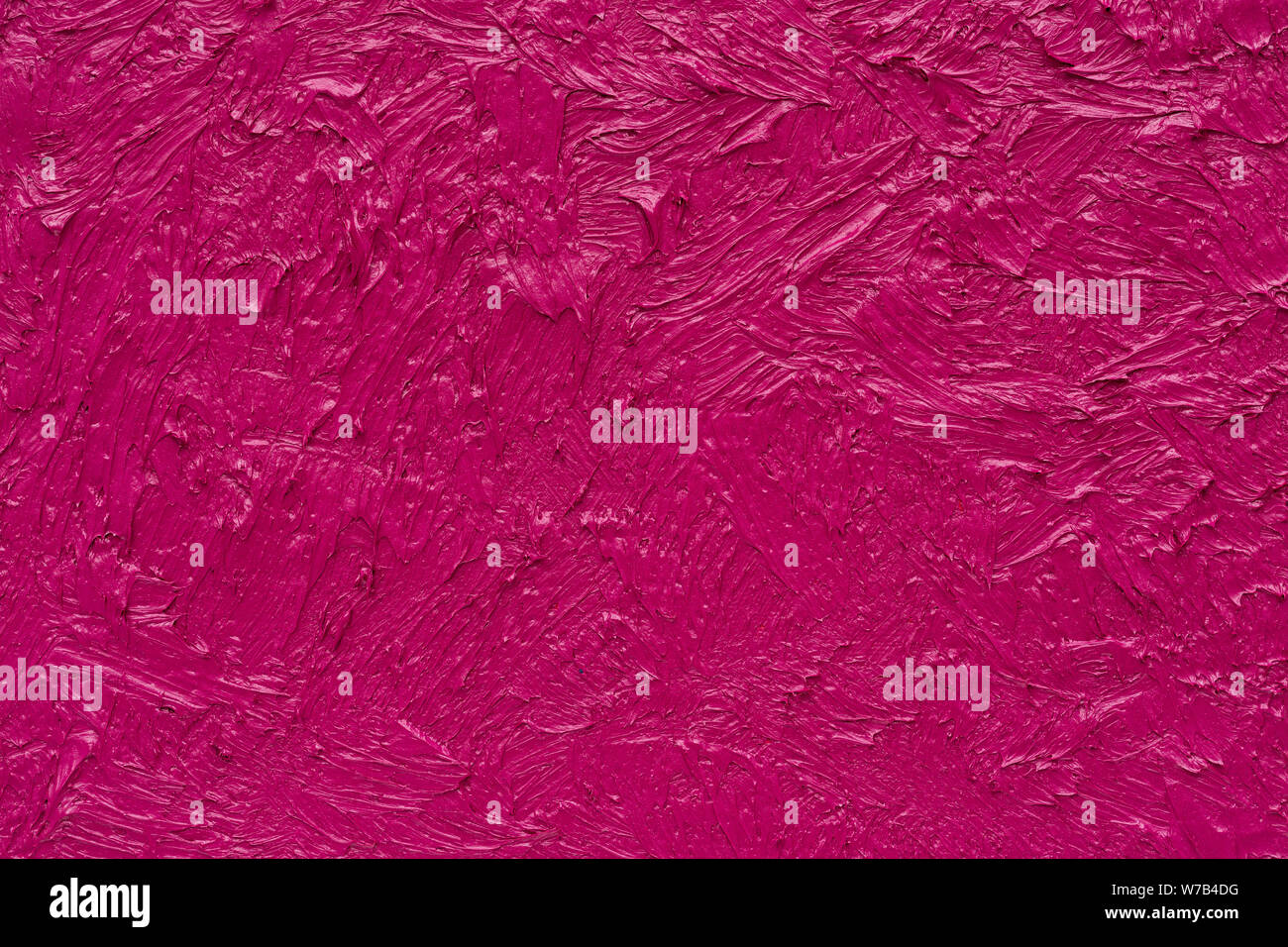 Abstract oil painting background. Background was painted with red magenta oil color on canvas by hand. Stock Photo