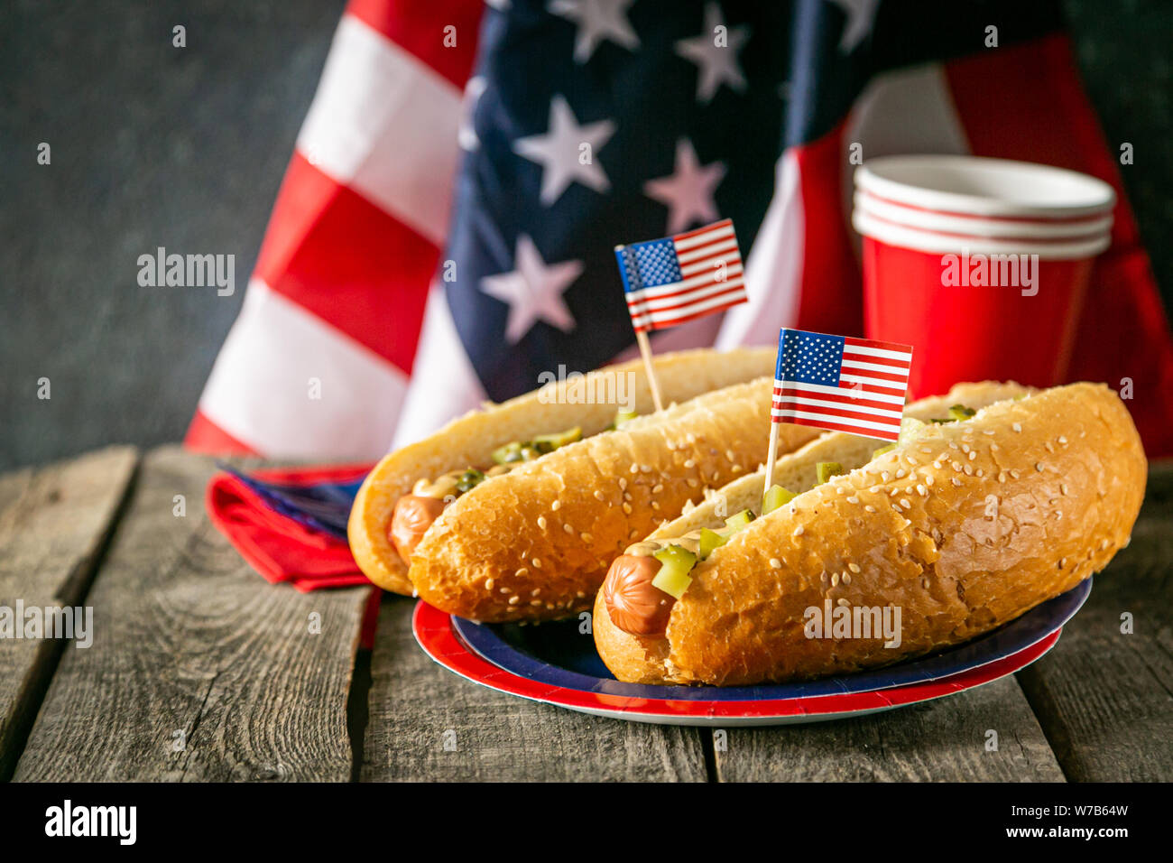 USA national holiday Labor Day, Memorial Day, Flag Day, 4th of July - hot dogs with ketchup and mustard on wood background Stock Photo