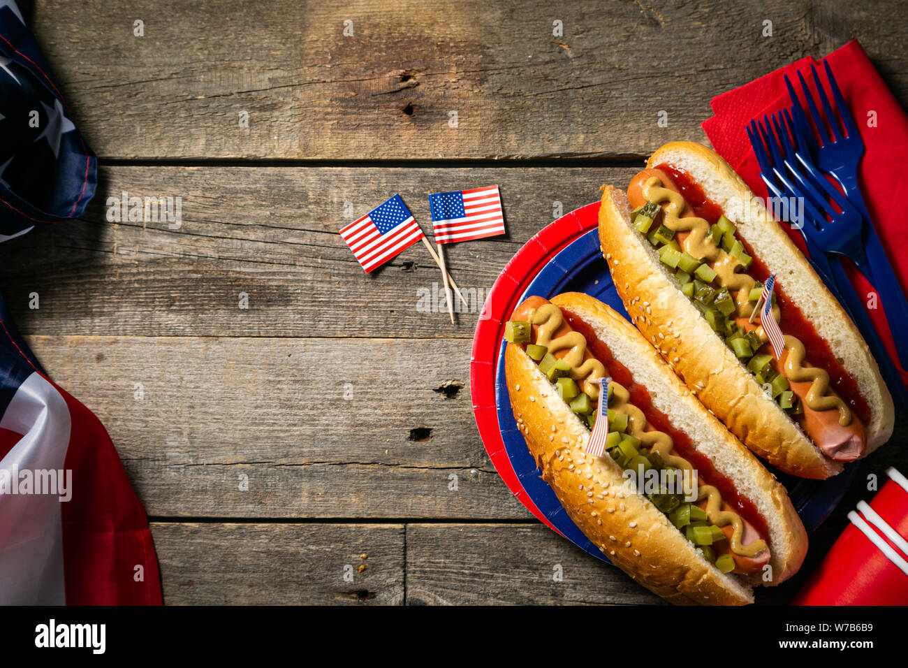 USA national holiday Labor Day, Memorial Day, Flag Day, 4th of July - hot dogs with ketchup and mustard on wood background Stock Photo