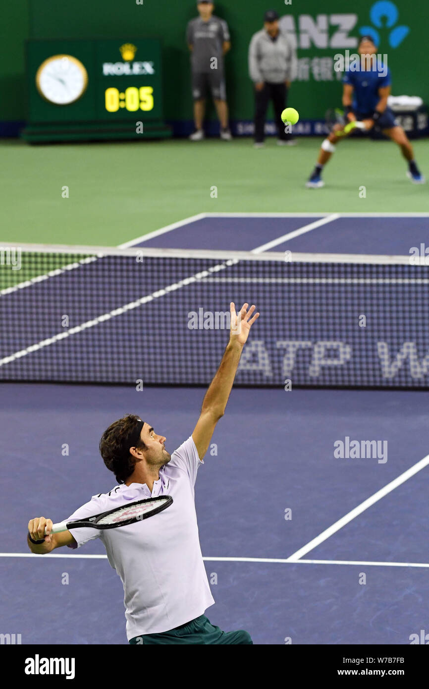 Roger Federer of Switzerland serves against Rafael Nadal of Spain in their  final of men's singles during the Shanghai Rolex Masters tennis tournament  Stock Photo - Alamy