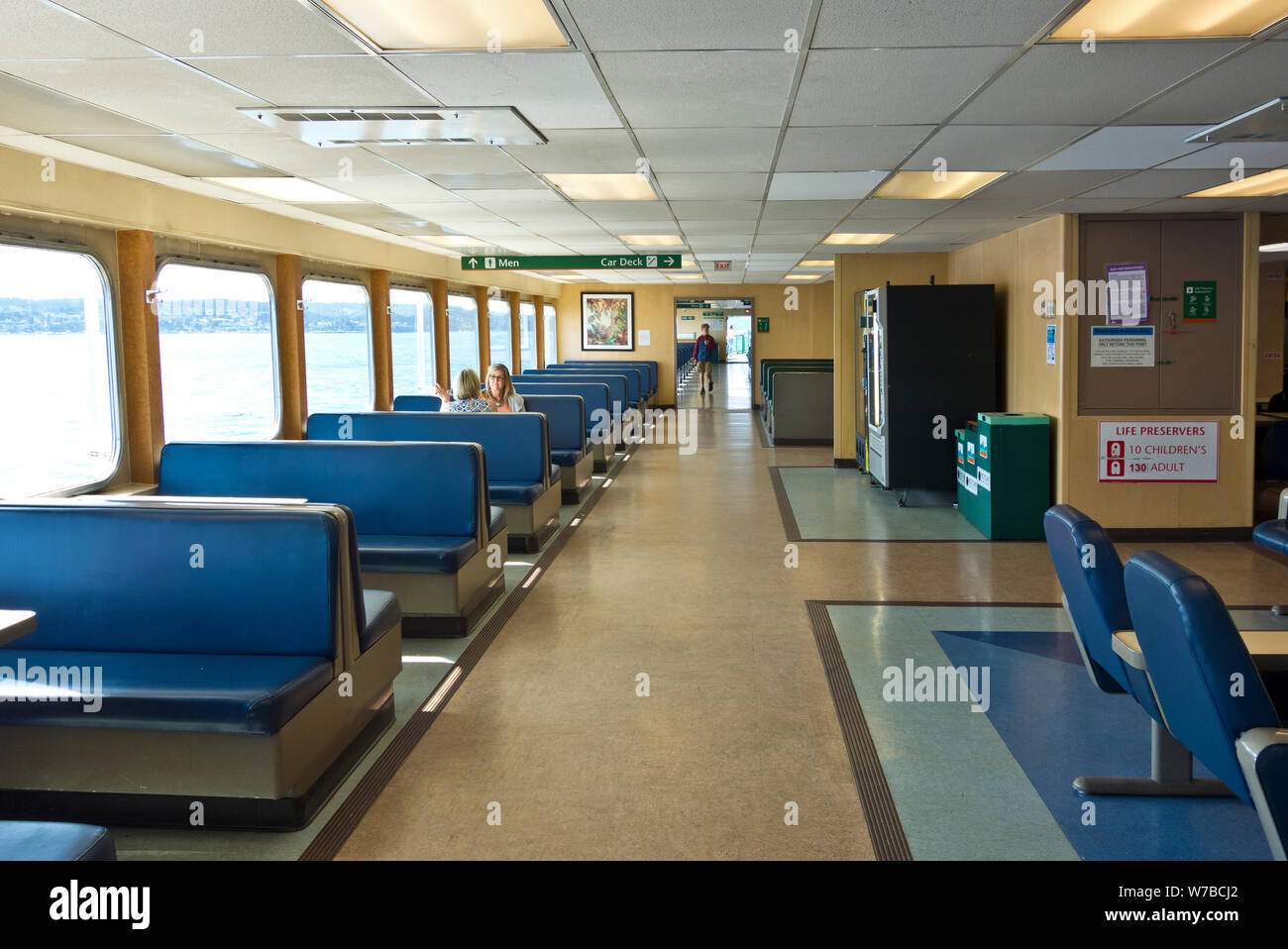 Interior of a  Washington State ferry traveling between Clinton on Whidbey Island and Mukilteo, on the mainland.  Passenger and vehicle ferry. Stock Photo