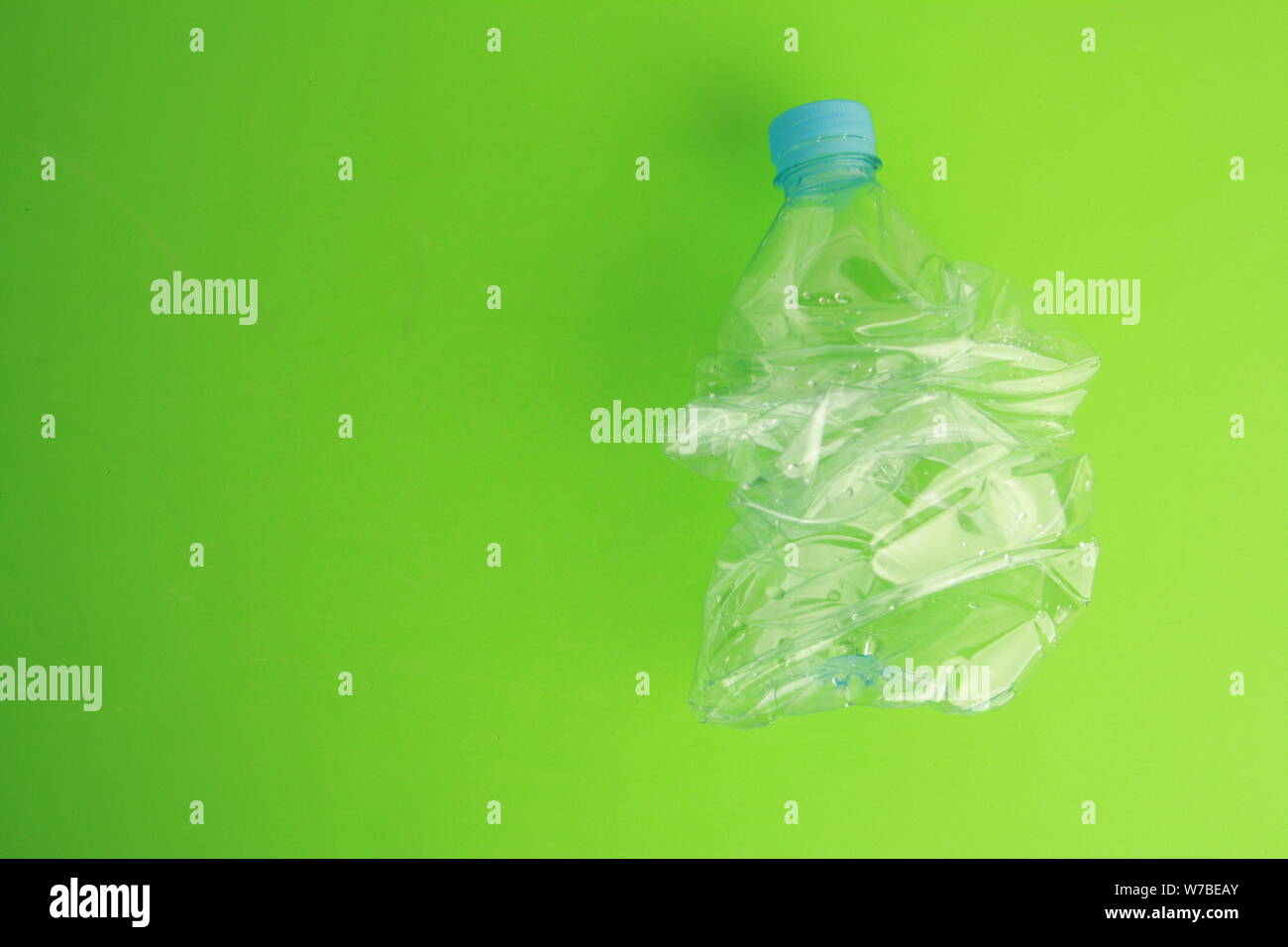 Empty plastic water bottle scaled for recycling Stock Photo