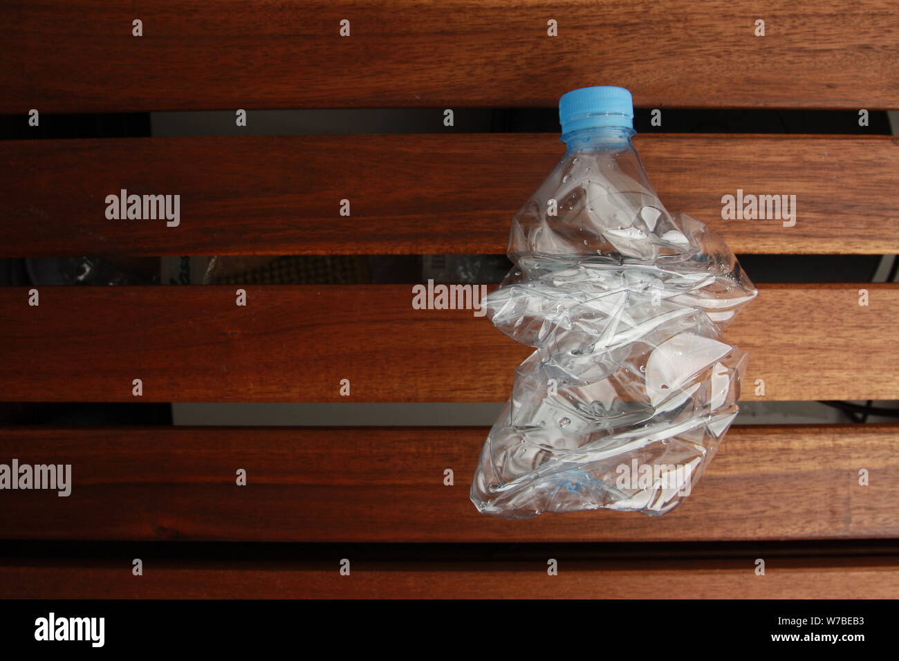 Empty plastic water bottle scaled for recycling Stock Photo