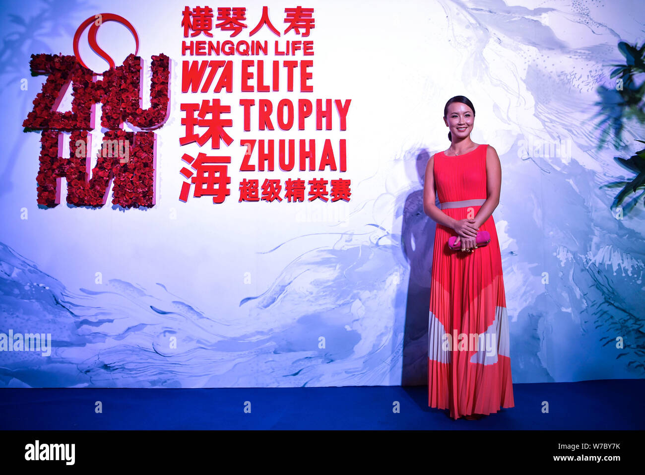 Chinese tennis player Peng Shuai poses as she arrives at the reception