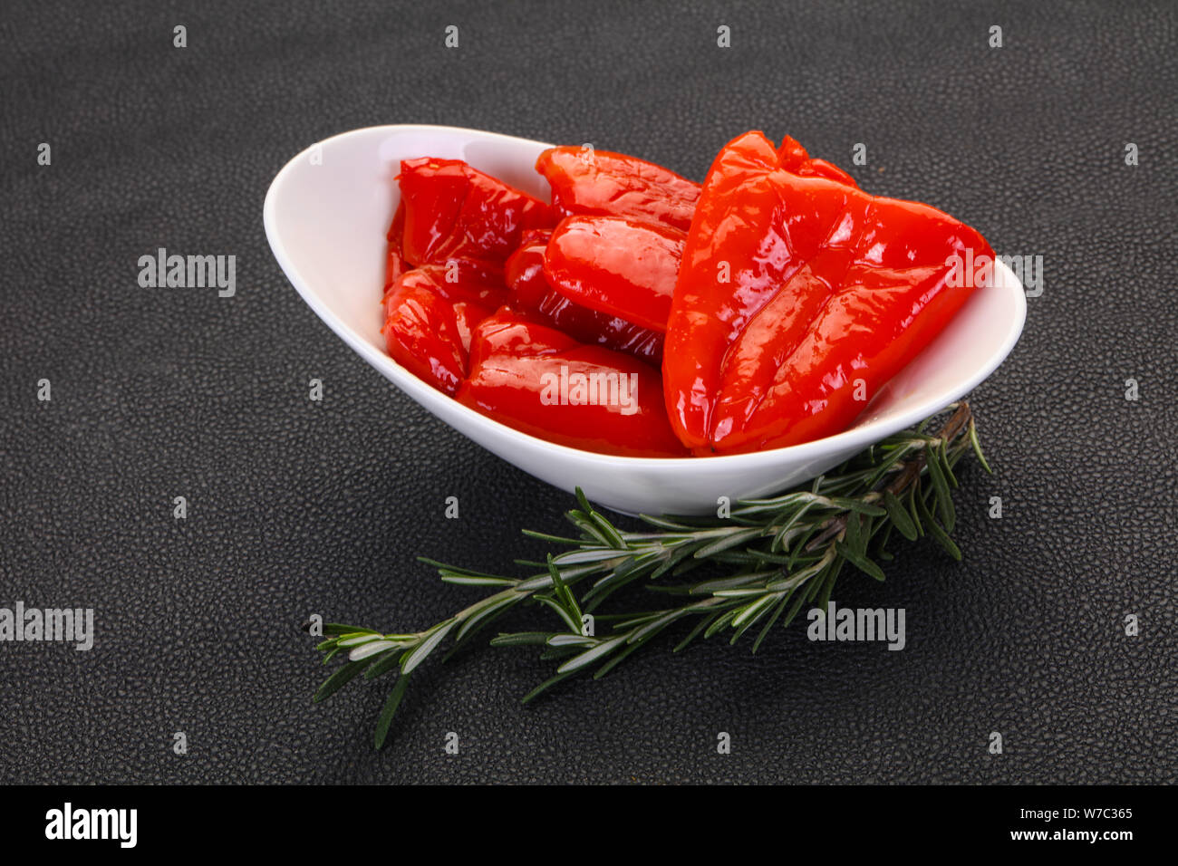 Pickled red bell pepper with oil Stock Photo Alamy