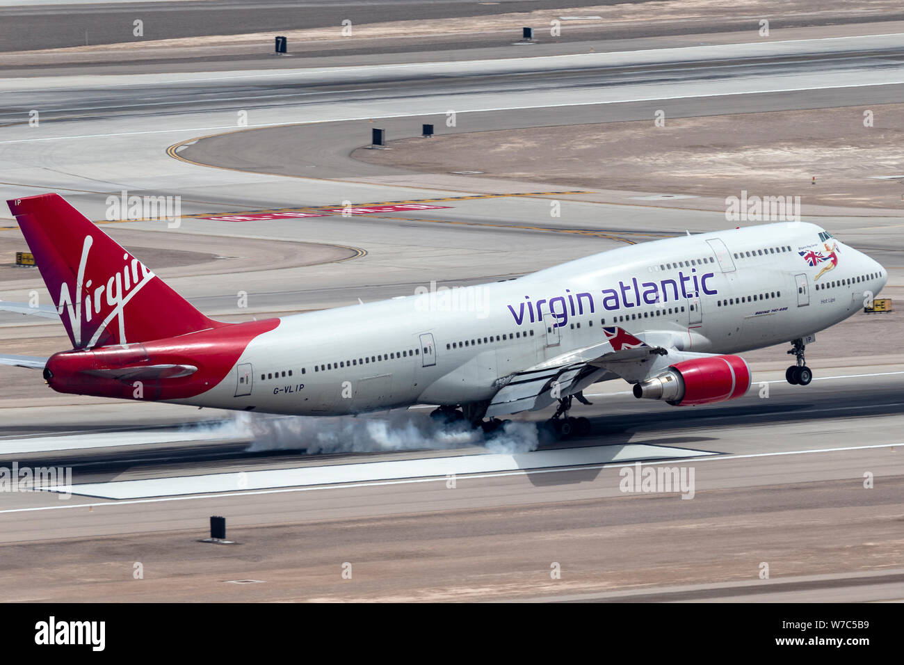 Virgin Atlantic Airways Boeing 747-400 jumbo jet touching down on the runway at McCarran International Airport in Las Vegas. Stock Photo