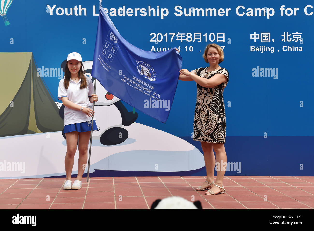 Agi Veres, right, Country Director of the United Nations Development Programe (UNDP) in China, poses during the completion ceremony of the world's fir Stock Photo