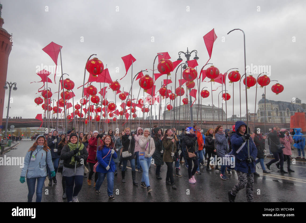 Students representing China hold red lanterns during their march to mark the 19th World Festival of Youth and Students in Moscow, Russia, 14 October 2 Stock Photo