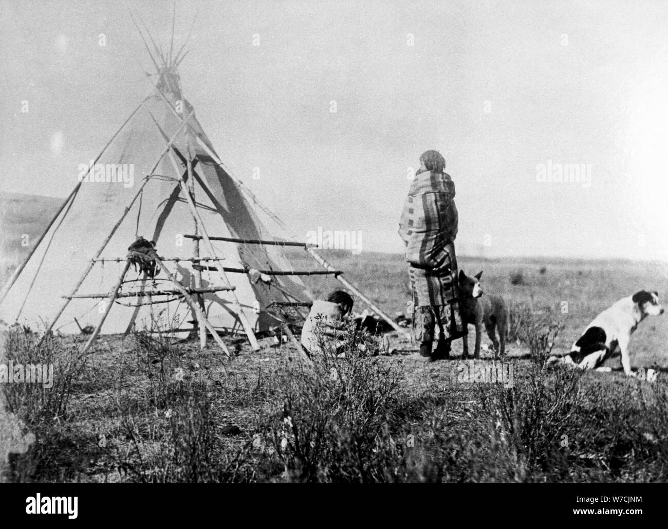 Cree North American Indian outside tepee, c1885-1890. Artist: Unknown Stock Photo