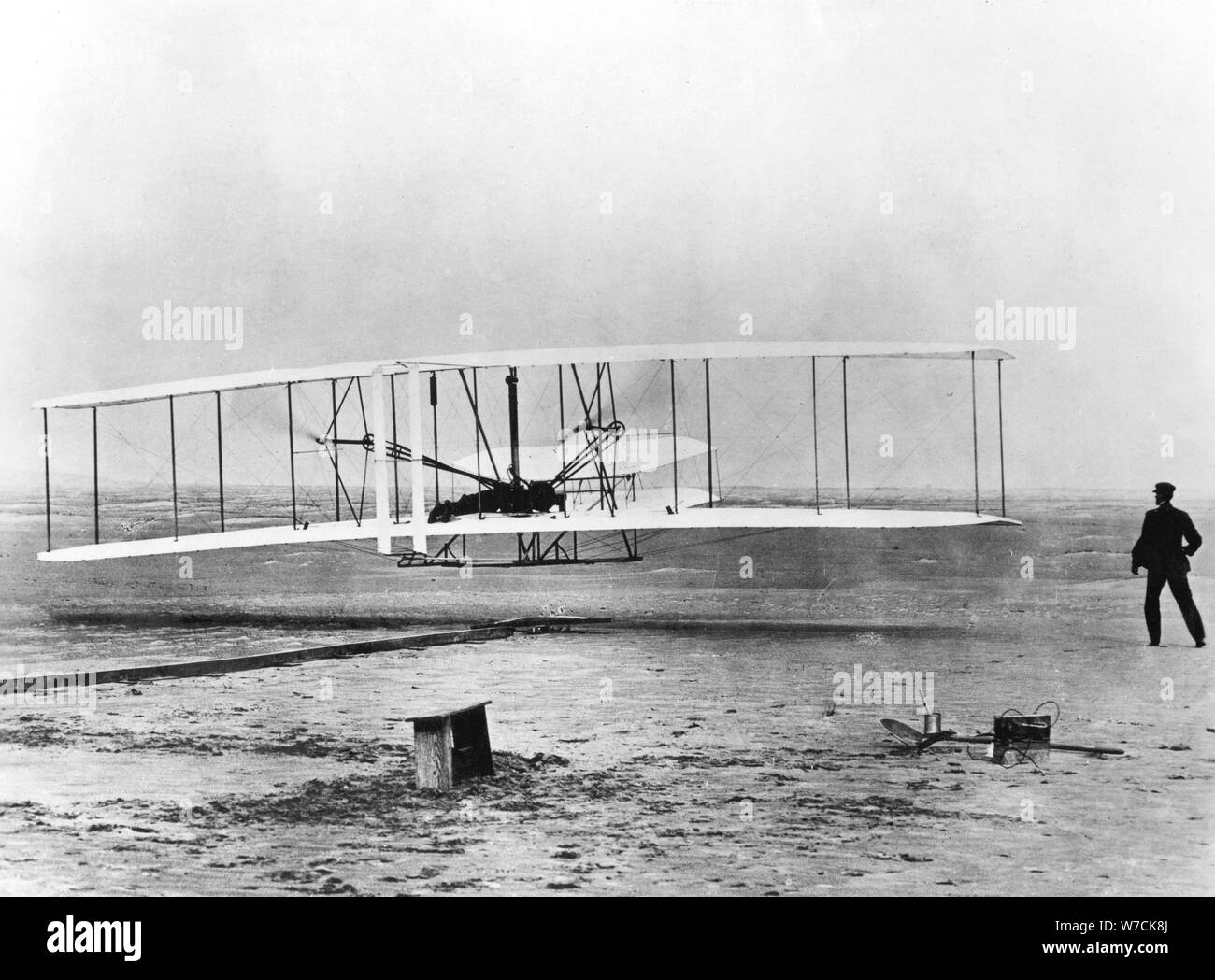 Wilbur and Orville Wright and the first powered flight, North Carolina, December 17 1903. Artist: Unknown Stock Photo