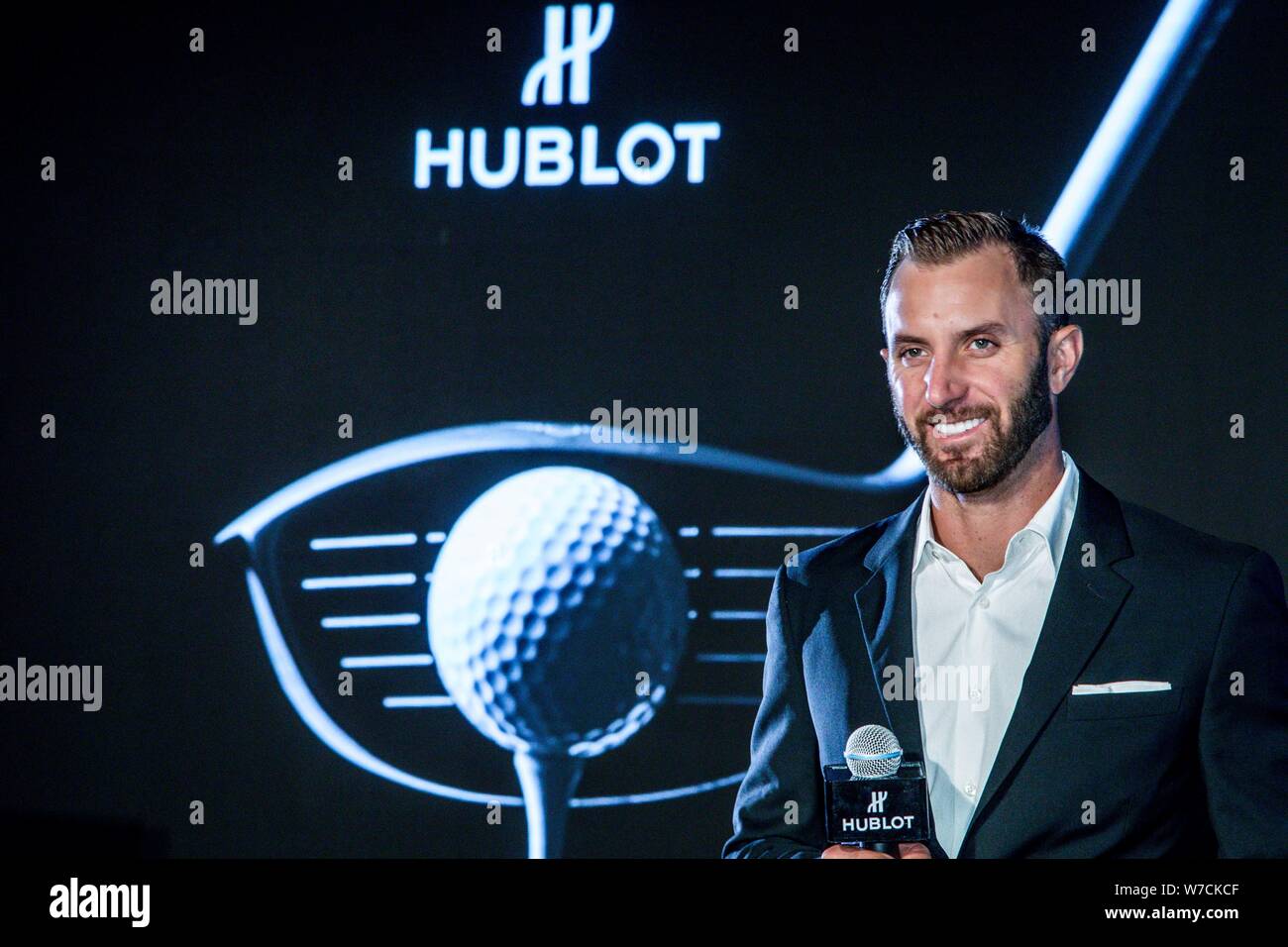 American golfer Dustin Johnson poses during a press conference for