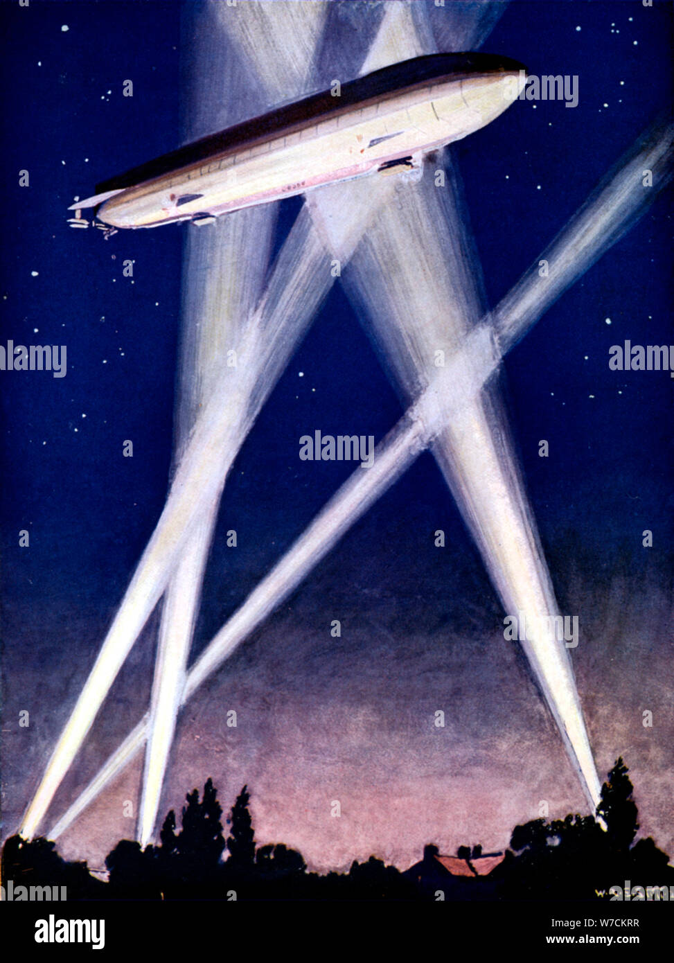 Zeppelin airship caught in searchlights during a bombing raid over England, 1916. Artist: Unknown Stock Photo