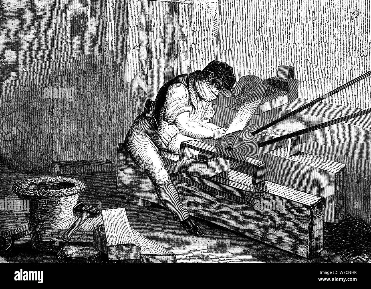 Grinding needle points, Redditch, England, c1830. Artist: Unknown Stock Photo