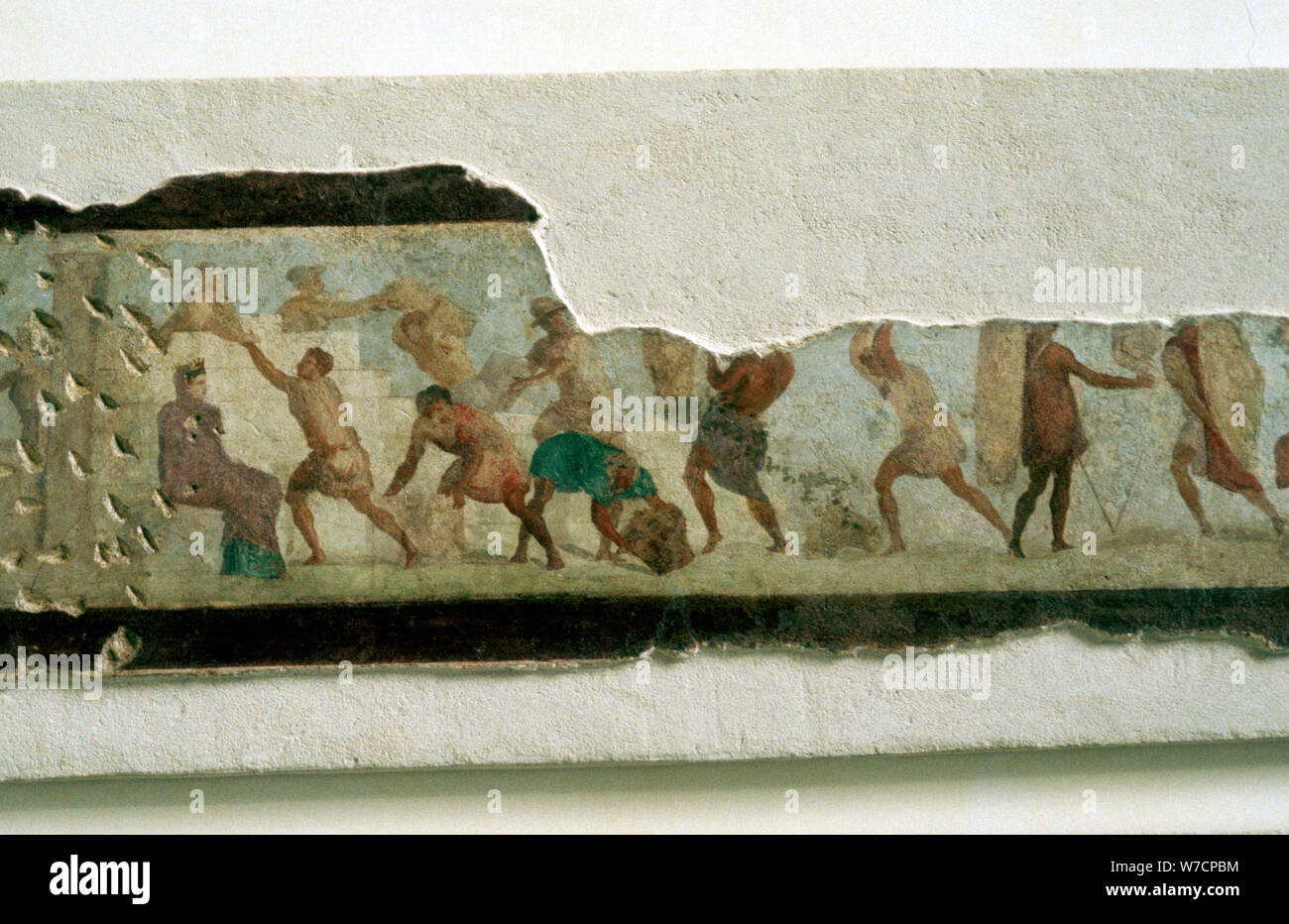 Slaves building a wall watched by a taskmaster, Roman. Artist: Unknown Stock Photo