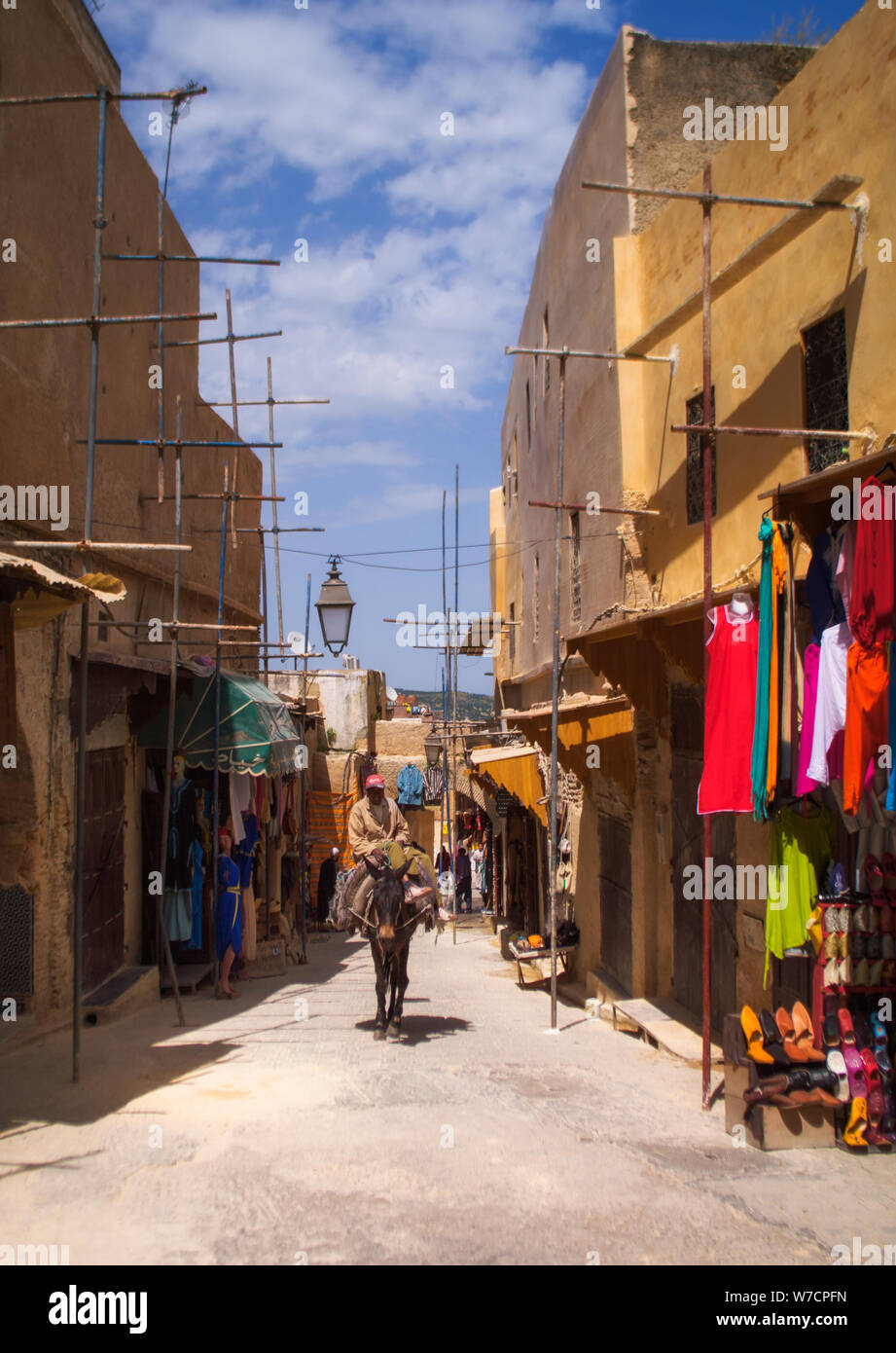 View of the narrow Moroccan streets of the old city. Stock Photo