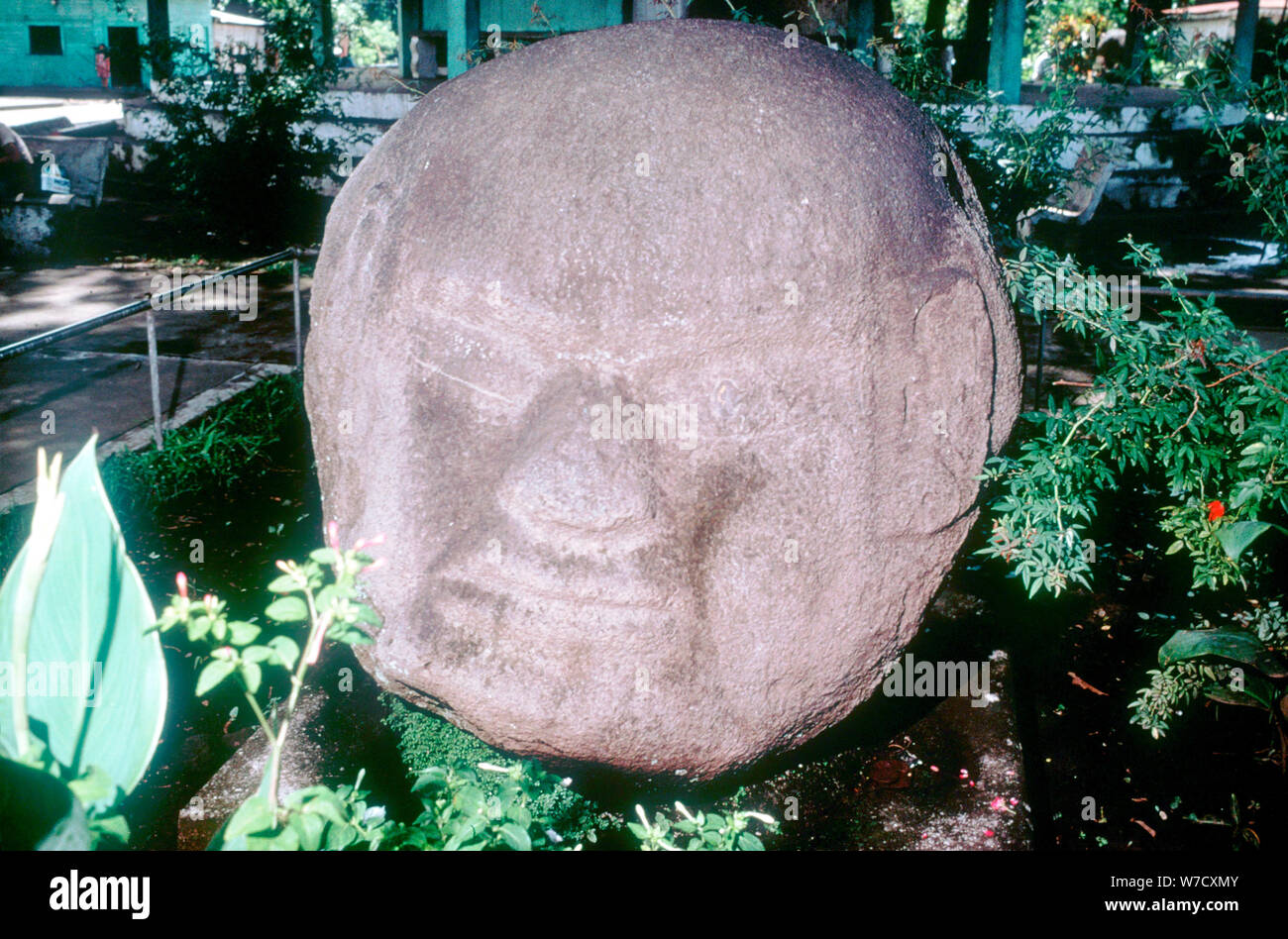 Carved monolithic head from Monte Alto, Guatemala, Pre-Columbian, Pre-Classic period, 1500-100 BC. Artist: Unknown Stock Photo