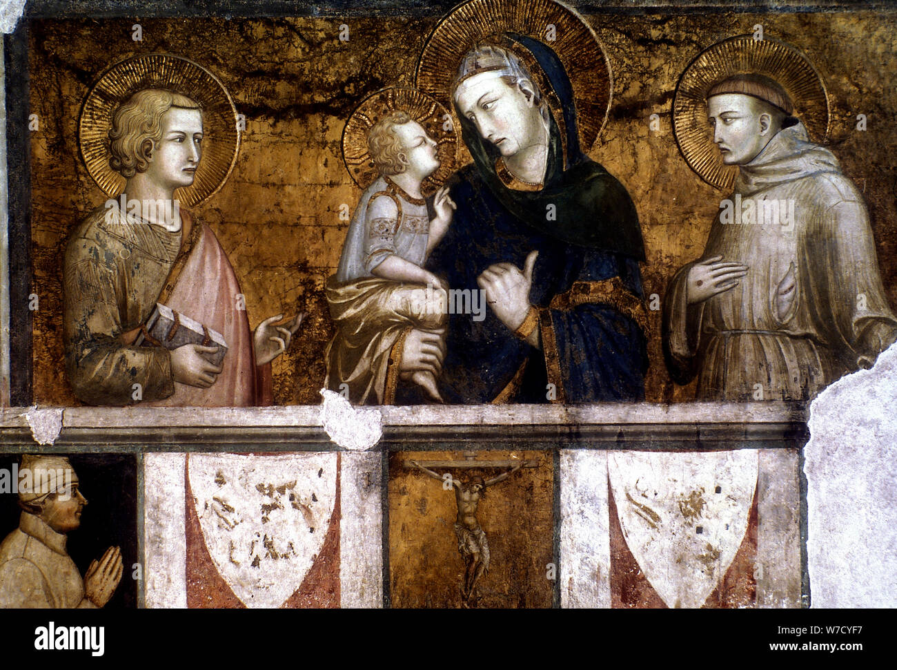 'Madonna and Child between St Francis and St John the Evangelist', c1320s. Artist: Pietro Lorenzetti Stock Photo