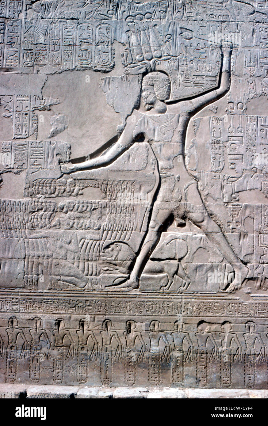 Detail of a relief of Pharaoh smiting his enemies, Temple of Khnum, Ptolemaic & Roman Periods. Artist: Unknown Stock Photo