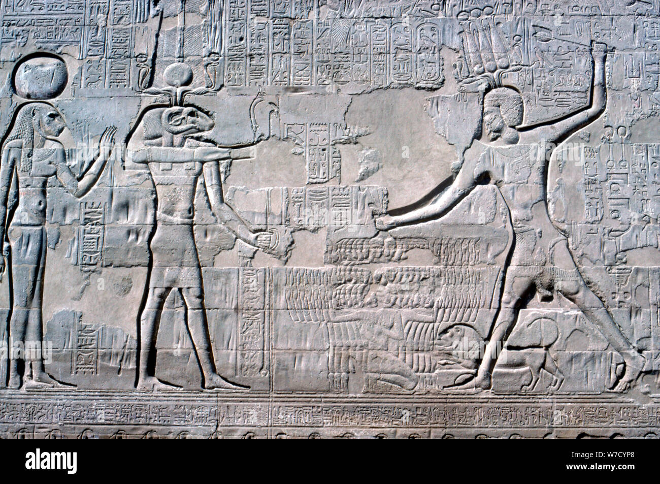 Relief of Pharaoh before Knum & Sekhmet, Temple of Khnum, Ptolemaic & Roman Periods. Artist: Unknown Stock Photo