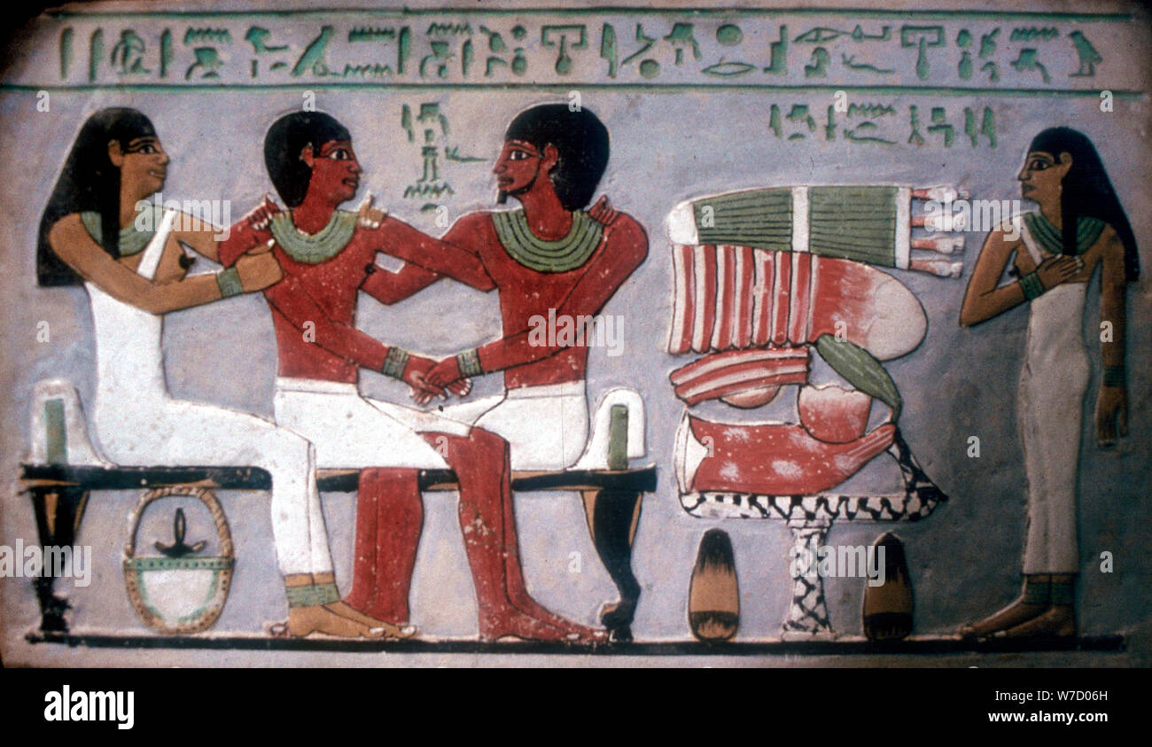 Relief of Imn-Hat seated with his wife & son in front of an offering, Thebes, c2050-c1786 BC. Artist: Unknown Stock Photo