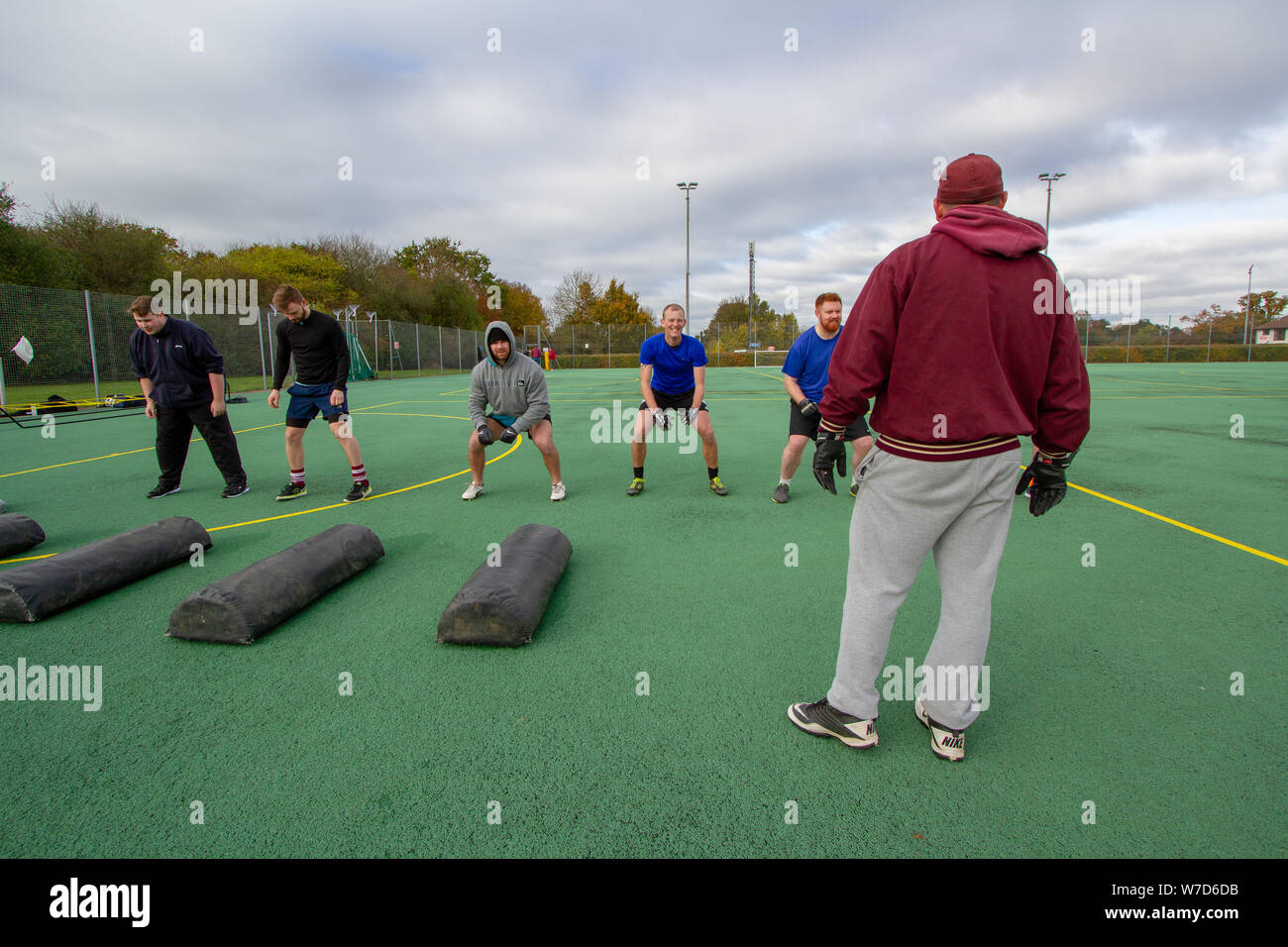 Rookies being coached at British american football team Ipswich Cardinals Stock Photo