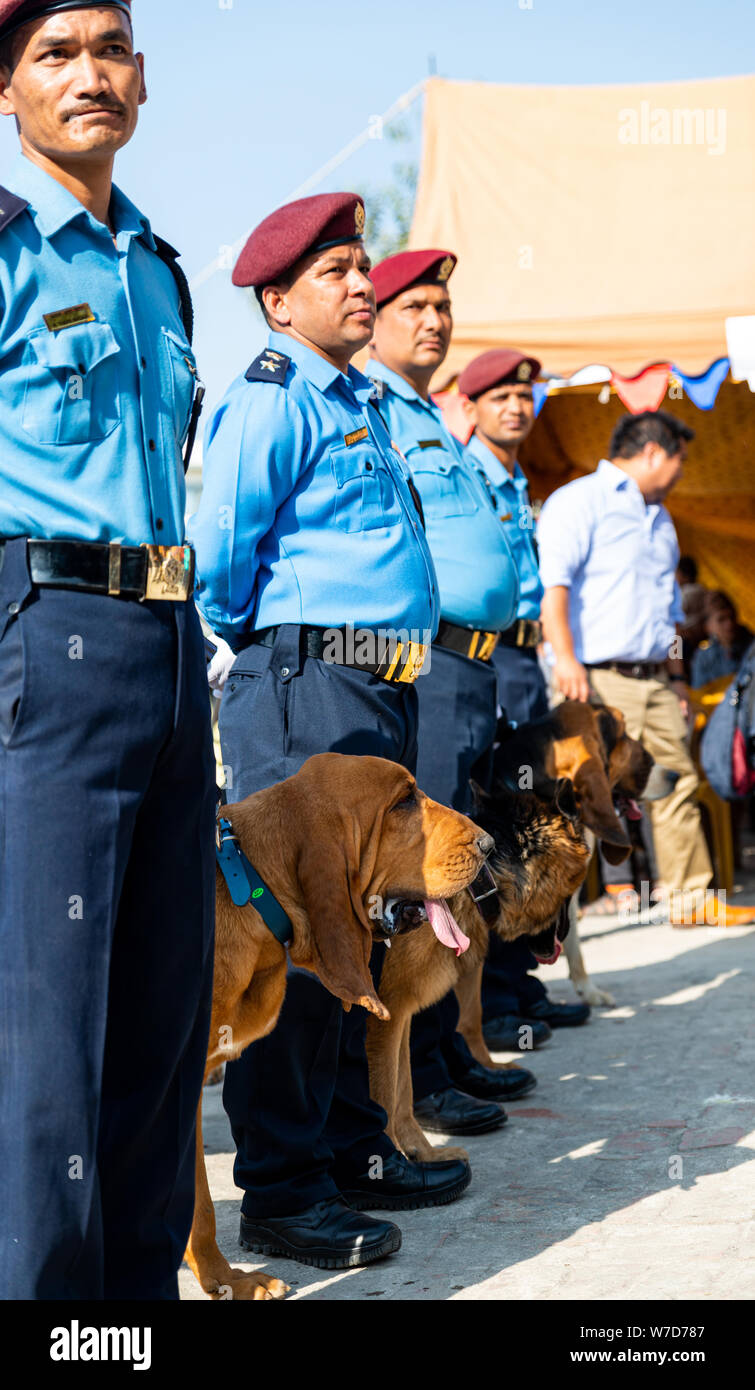 KATHMANDU, NEPAL - NOVEMBER 6, 2018: Nepal police celebrates Kukur Tihar (dog festival) at Central Police Dog Training School. Stock Photo