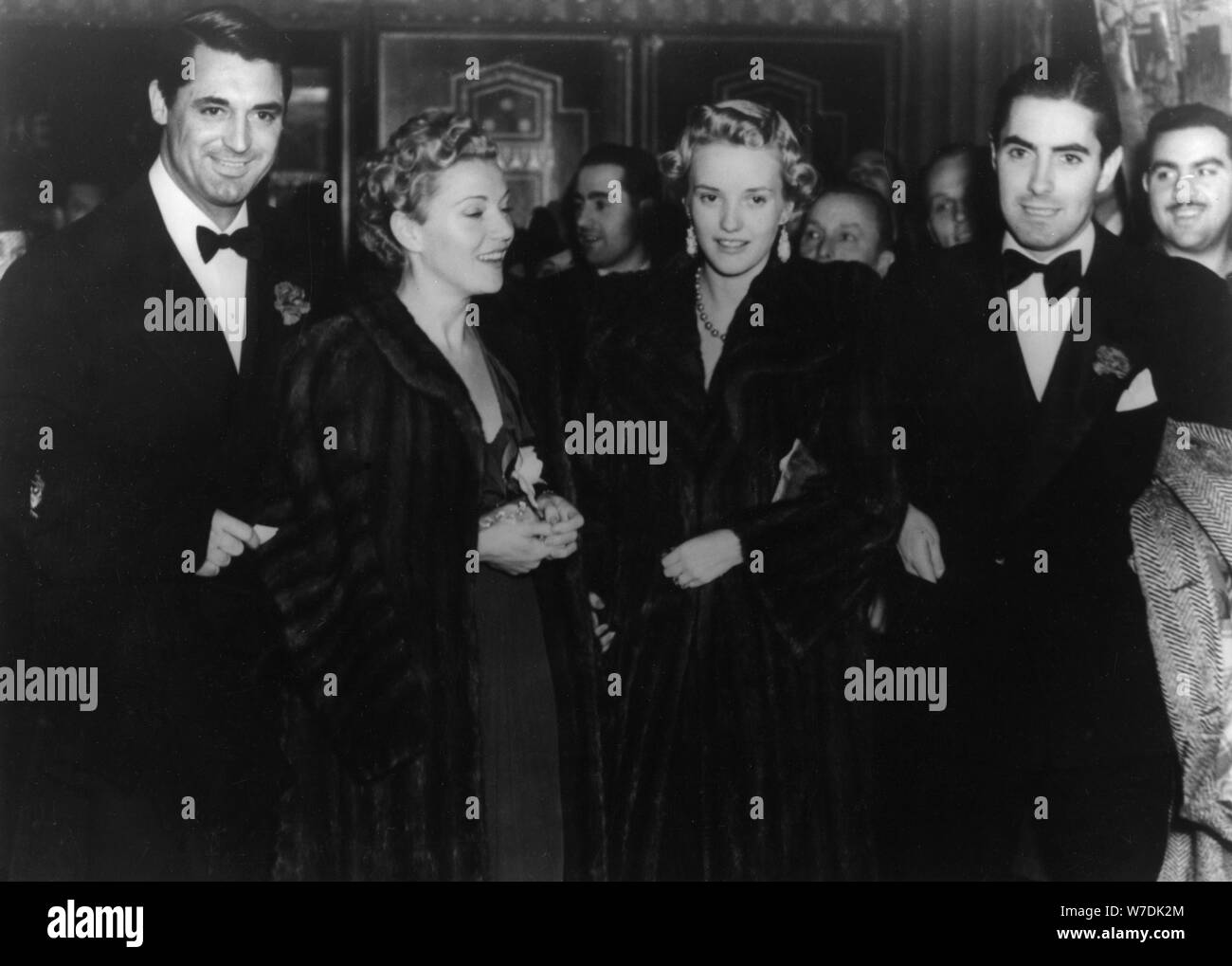 Actors Cary Grant, Anabella, Phyllis Brooks and Tyrone Power, Hollywood, California, 1938. Artist: Unknown Stock Photo