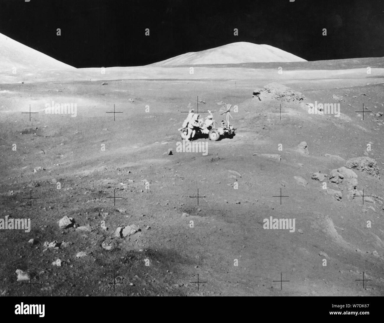 Lunarscape of Station 4, showing Harrison Schmitt at the lunar roving vehicle, 1972.  Creator: Unknown. Stock Photo