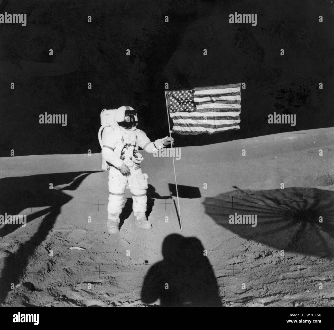 Alan Shepard (1923-1998) planting an American flag during the Apollo 14 mission, 1971. Artist: Unknown Stock Photo