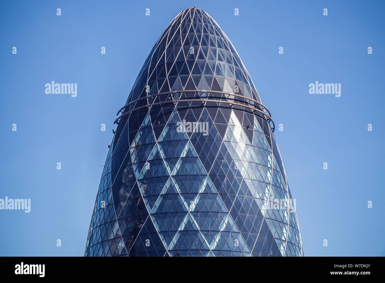 30 St Mary Axe (informally known as The Gherkin and previously as the Swiss Re Building) is a commercial skyscraper in London Stock Photo