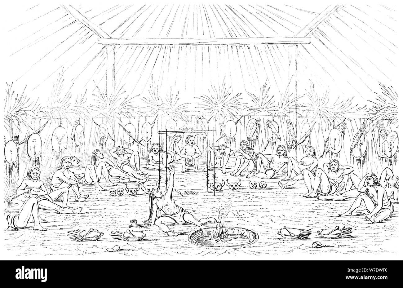 Medicine man and teepee interior, 1841.Artist: Myers and Co Stock Photo