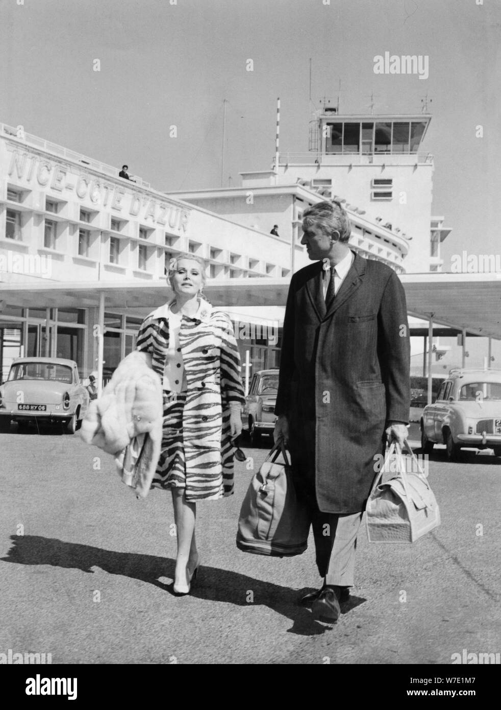 Zsa Zsa Gabor and her huband, Joshua S Cosden Jr, arrive at Nice Airport, France, c1966-c1967. Artist: Unknown Stock Photo