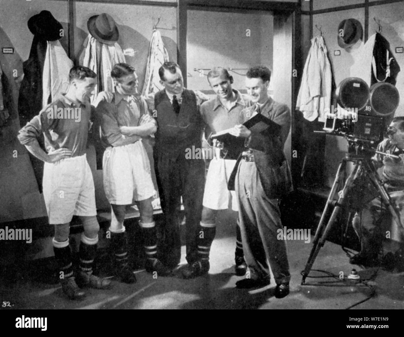 A pause for instruction from film producer Anthony Asquith, Twickenham, London, c1932. Artist: Unknown Stock Photo