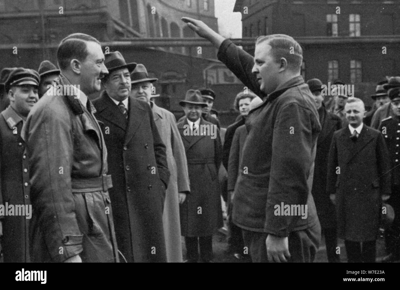 Adolf Hitler saluted by a representative of the staff of a factory, Germany, 1936. Artist: Unknown Stock Photo