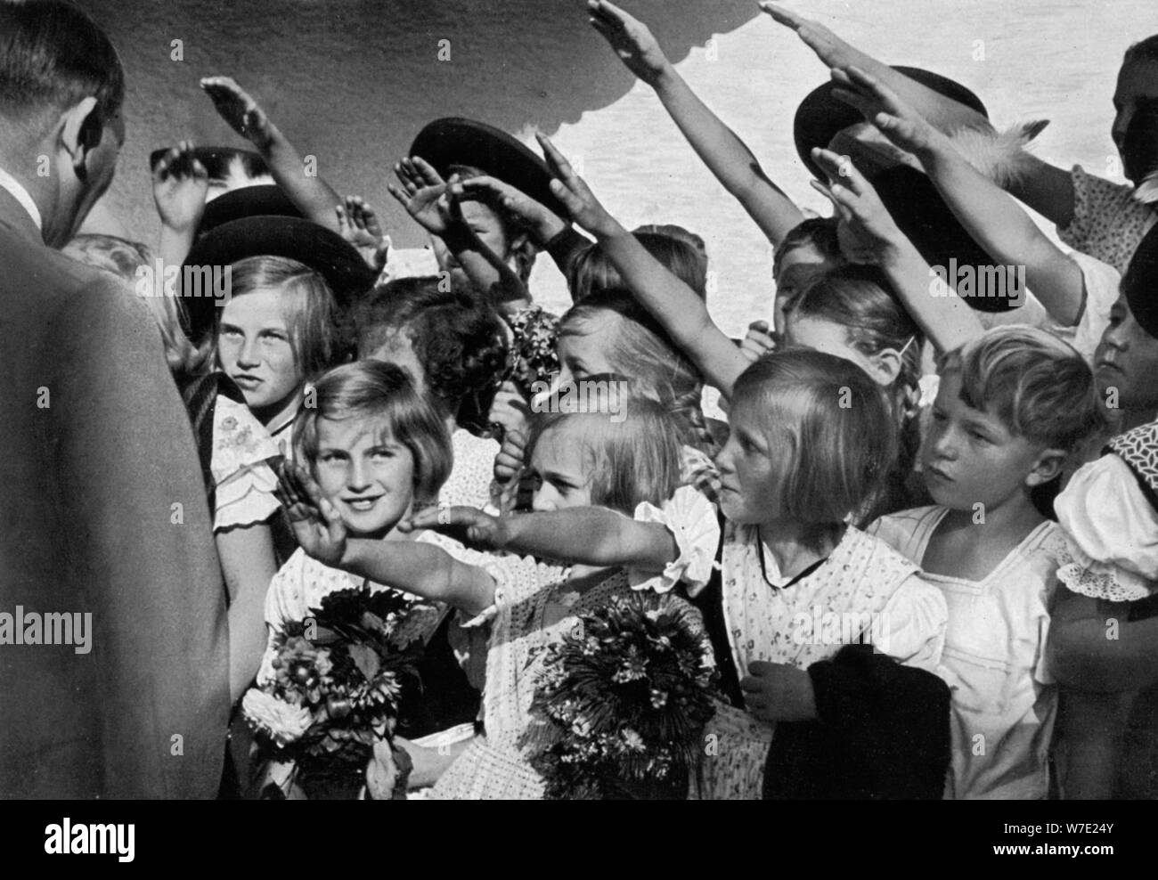 adolf-hitler-with-a-group-of-young-children-1936-artist-unknown-W7E24Y.jpg