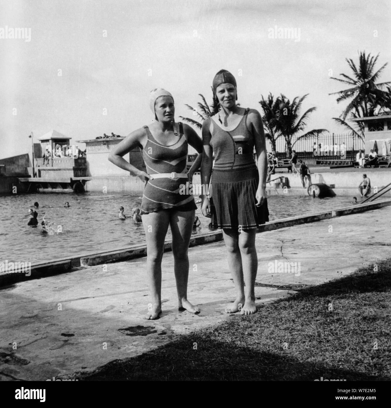 Two women in swimsuits beside a swimming pool, Balboa, Panama, 1931. Artist: Unknown Stock Photo