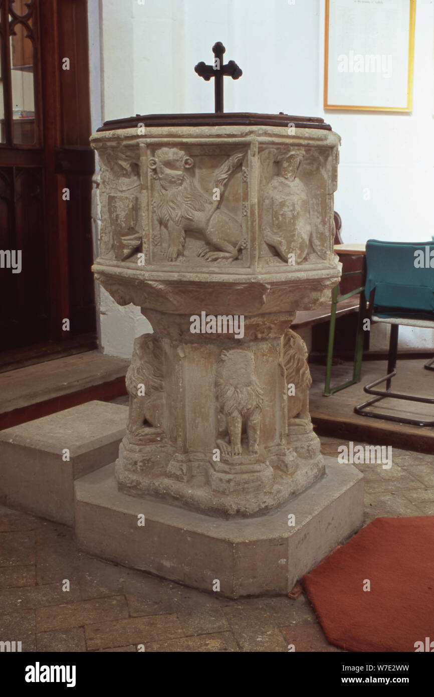 Font with damage done by Wm Dowsing, St Mary the Virgin Otley, Suffolk, UK. Stock Photo