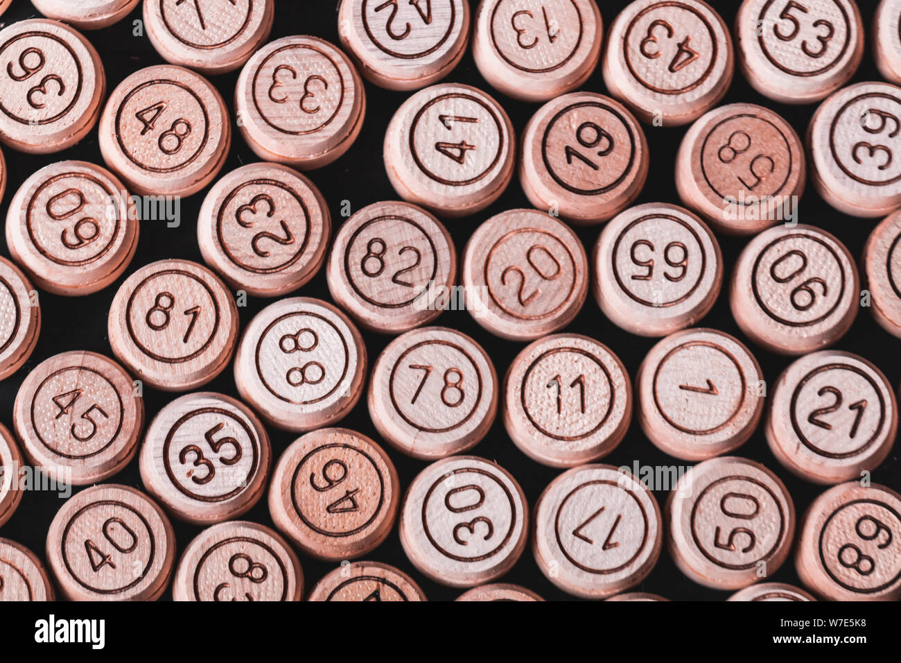 Russian lotto on a black wooden  background. Lotto game. Top view Stock Photo