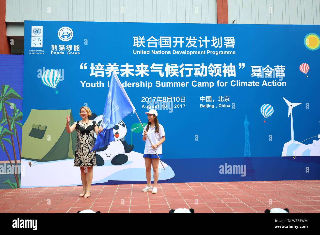 Agi Veres, left, Country Director of the United Nations Development Programe (UNDP) in China, poses during the completion ceremony of the world's firs Stock Photo