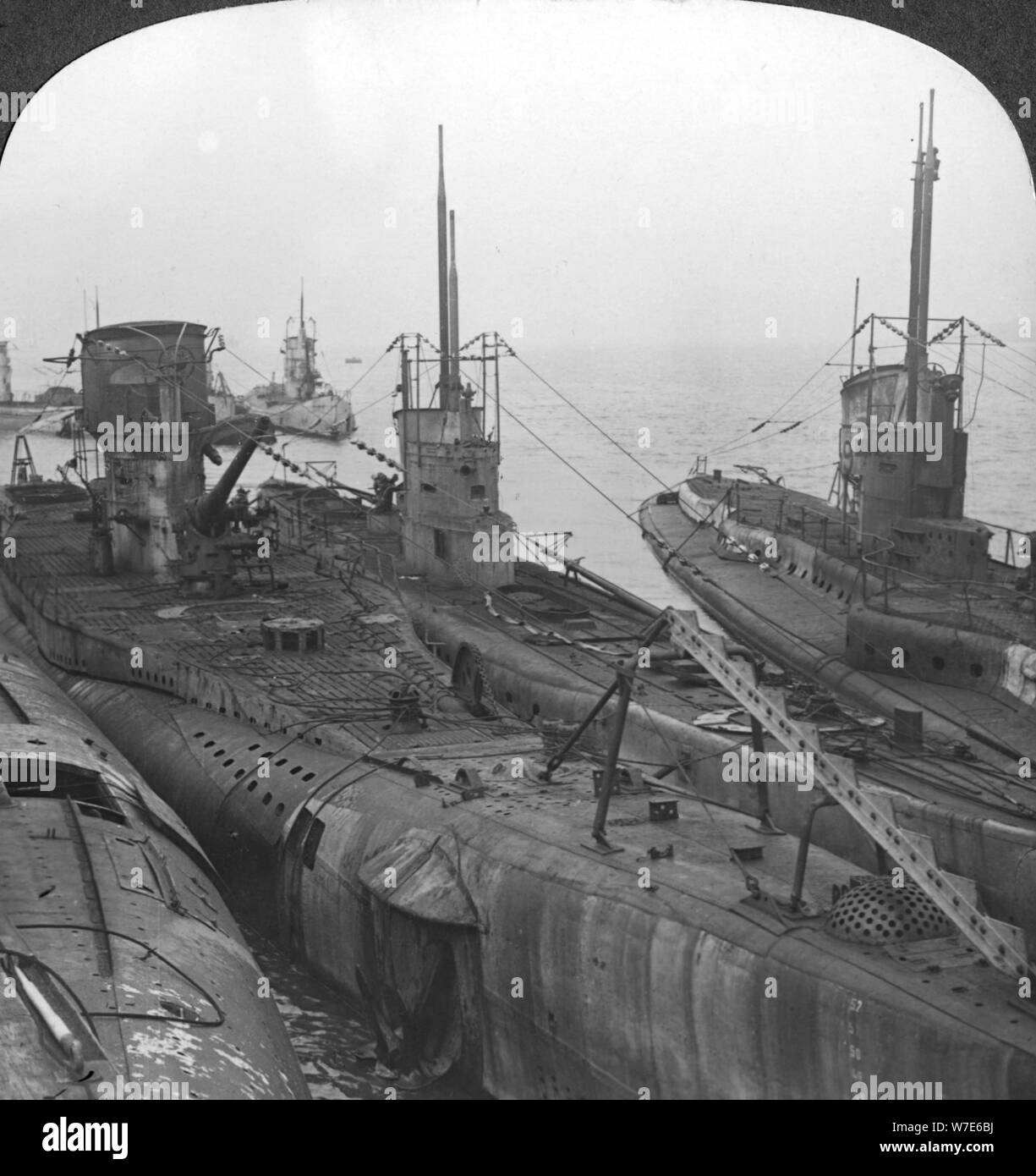 German submarines secured in a Channel port, c1918-c1919. Artist: Realistic Travels Publishers Stock Photo