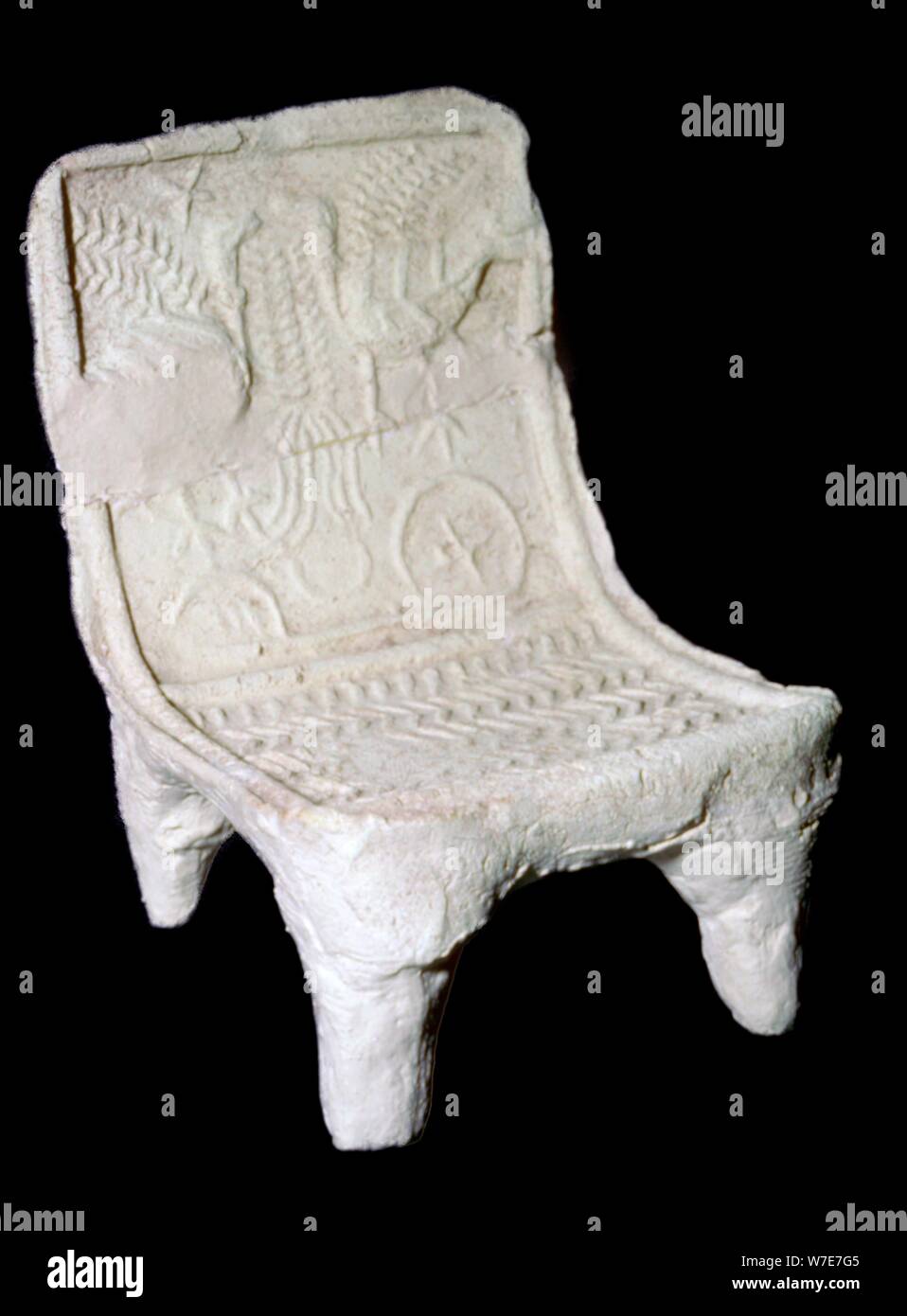Model terracotta chair from Ur with relief design of two birds. Artist: Unknown Stock Photo
