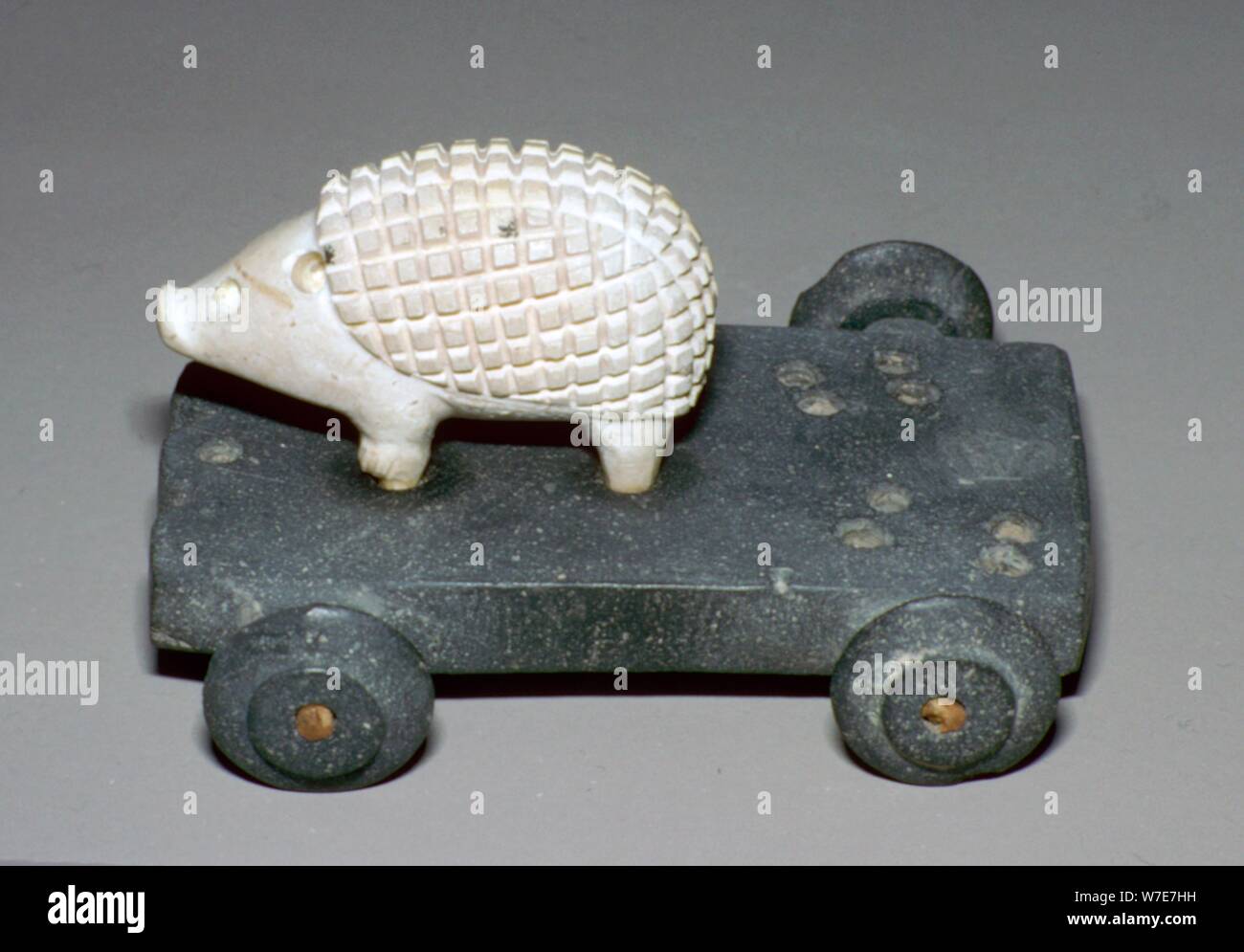 Persian hedgehog mounted on a wheeled carriage. Artist: Unknown Stock Photo