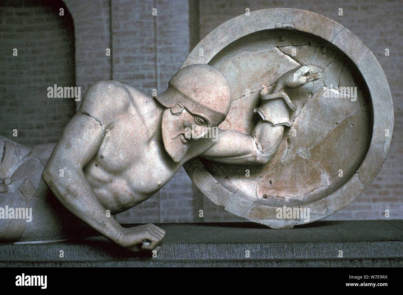 Sculpture of a fallen warrior from the Greek temple of Aphaia at Aegina, 6th century BC. Artist: Unknown Stock Photo