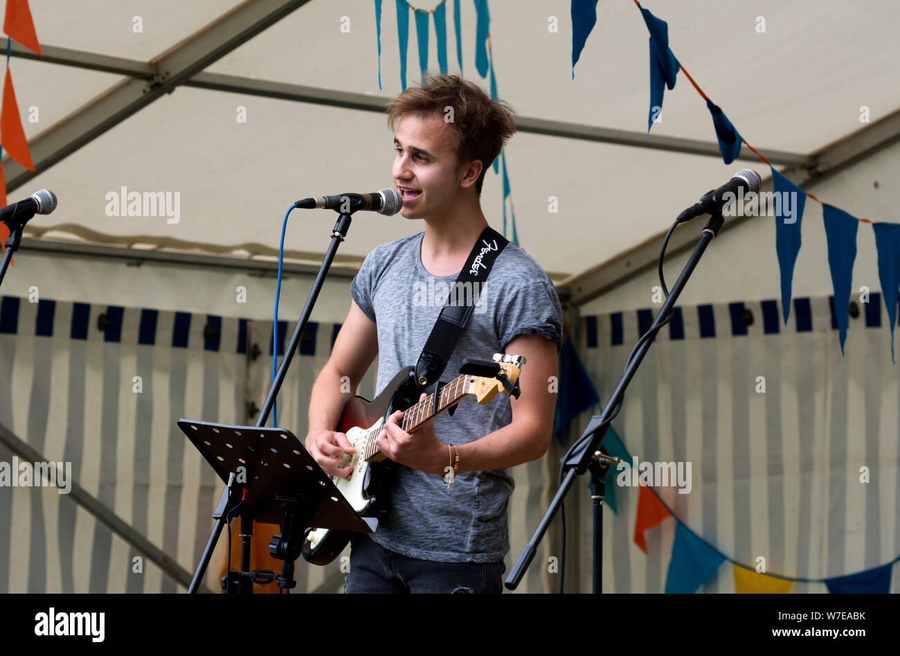 A young male singer/guitarist Stock Photo