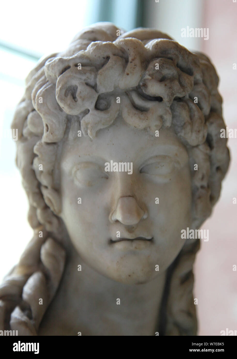 Head of a half figure of Eros, 2nd century. Artist: Unknown Stock Photo